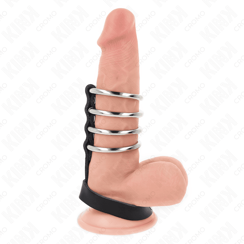 KINK – 4 ANNEAUX PÉNIS EN MÉTAL 3,8 CM CONNECTÉS AVEC SANGLE EN CUIR 22 X 1,5 CM ET FERMETURE À PRESSION